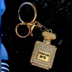 Parfum #5 keychain; new with box.
